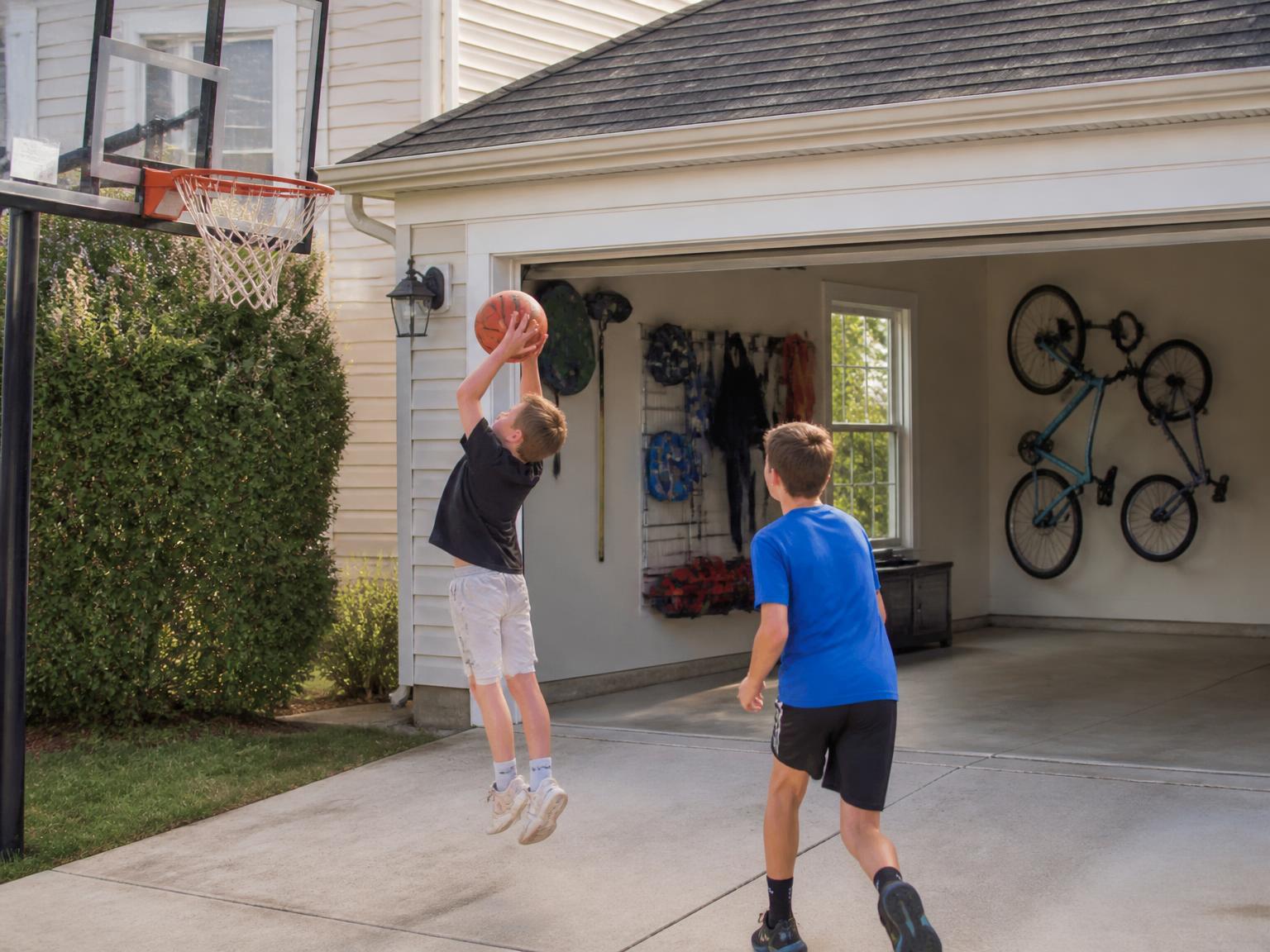 The driveway becomes a court again. — garage cleanout and organization in Raleigh, NC